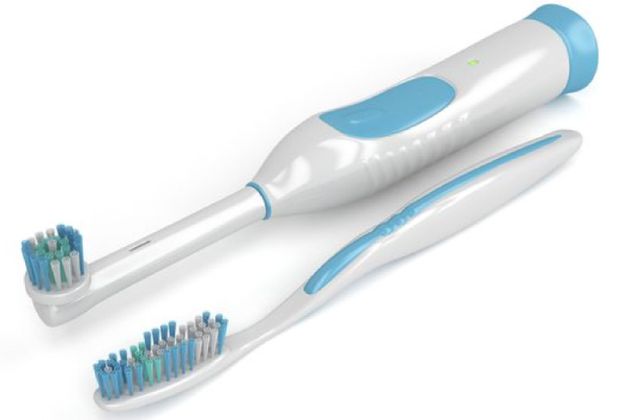 electric and regular toothbrushes side by side